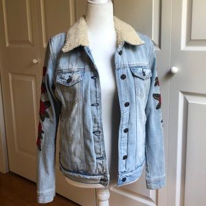 Denim trucker jacket with roses.